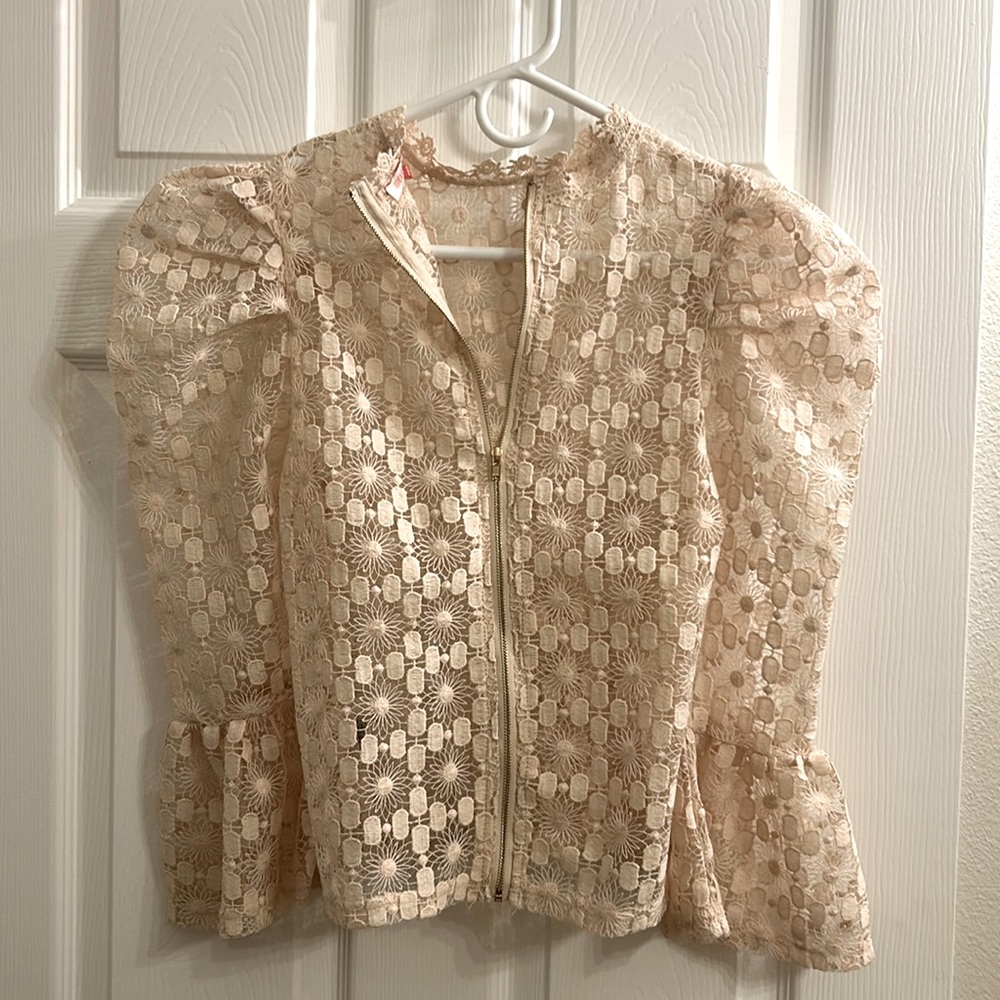 Embroidered, zip up jacket.